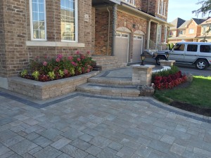 Front Interlocking Stone Driveway and Steps With Accent Lights